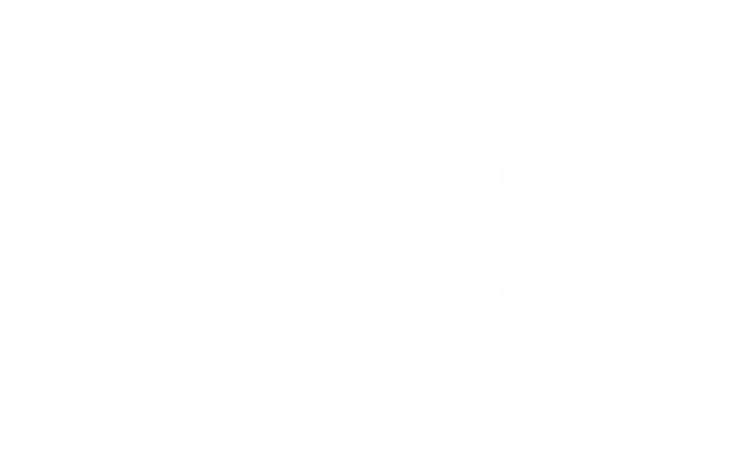 DŪRM wellness logo in white with leaf, Reno, NV